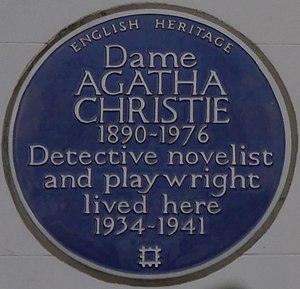 Colour photograph of a wall plaque stating Christie "lived here 1934–1941"