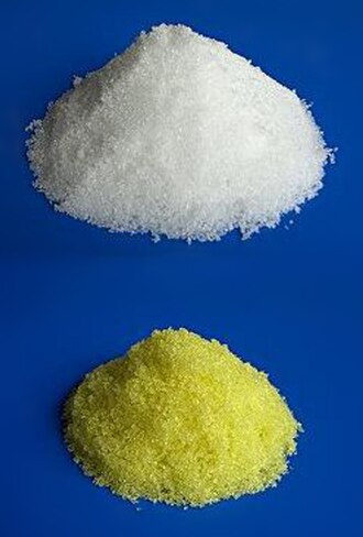 Aluminium trichloride hexahydrate, pure (top), and contaminated with iron(III) chloride (bottom)