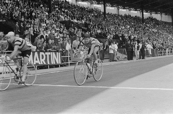 Julien Schepens crossing the finish line ahead of Jacques Marinelli to win stage two at Heysel Stadium in Brussels