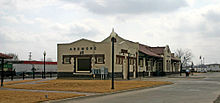 Historic Santa Fe Rail Station and adjacent track yard. This facility serves as the Amtrak station for Ardmore on the Heartland Flyer route.