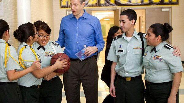 Students from many different countries greet U.S. Secretary of Education Arne Duncan as he stopped by Lee High School to compliment on the success it 