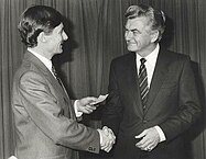 Hawke presenting a relief cheque to South Australian Premier John Bannon following the 1983 bushfires