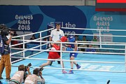 Deutsch: Boxen bei den Olympischen Jugendspielen 2018 Tag 12, 18. Oktober 2018 - Kampf um die Bronzemedaille im Fliegengewicht Mädchen – Heaven Destiny Garcia (USA, blau) schlägt Goryanana Stoeva (Bulgarien, rot) 5-0; Ringrichter ist Ishanguly Meretnyyazov (Turkmenistan). English: Boxing at the 2018 Summer Youth Olympics on 18 October 2018 – Girl's flyweight Bronze Medal Bout - Heaven Destiny Garcia (USA, blue) beats Goryanana Stoeva (Bulgaria, red) 5-0; Referee is Ishanguly Meretnyyazov (Turkmenistan). Español: Boxeo en los Juegos Olímpicos Juveniles de Verano de 2018 en 18 de octubre de 2018 - Combate a medalla de bronce de peso mosca para mujeres: Heaven Destiny Garcia (Estados Unidos, azul) le gana a Goryanana Stoeva (Bulgaria, roja) 5-0; El árbitro es Ishanguly Meretnyyazov (Turkmenistán).