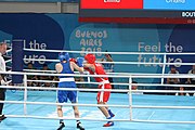 Deutsch: Boxen bei den Olympischen Jugendspielen 2018 Tag 12, 18. Oktober 2018 - Finale Leichtgewicht Mädchen – Oriana Saputo (Argentinien, blau) schlägt Emma Lawson (Australien, rot) 5-0; Ringrichter ist José Romero (Spanien). English: Boxing at the 2018 Summer Youth Olympics on 18 October 2018 – Girls' lightweight Bronze Medal Bout – Oriana Saputo (Argentina, blue) wins over Emma Lawson (Australie, red) 5-0; Referee is José Romero (Spain). Español: Boxeo en los Juegos Olímpicos Juveniles de Verano de 2018 en 18 de octubre de 2018 - Combate de medalla de bronce de las niñas: Oriana Saputo (Argentina, azul) gana a Emma Lawson (Australie, roja) 5-0; Árbitro es José Romero (España).