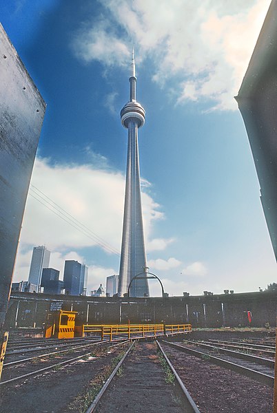 File:CN Tower from a Railroad Perspective -- 3 Photos (34086712223).jpg