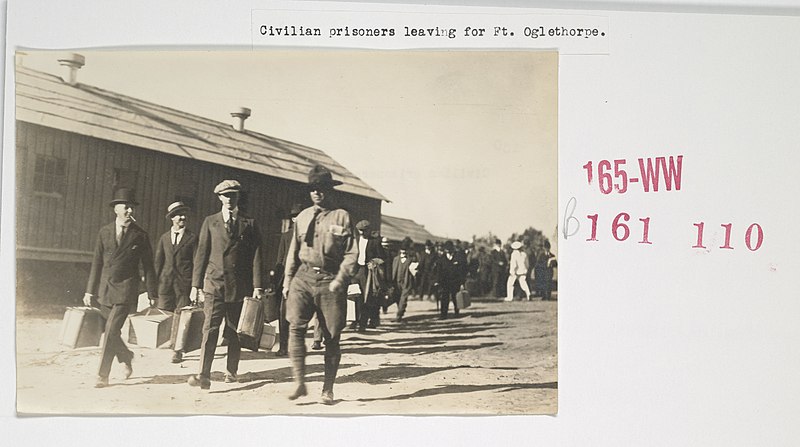 File:Enemy Activities - Internment Camps - Fort McPherson, Georgia - Civilian prisoners leaving for Fort Oglethorpe - NARA - 31479573.jpg