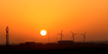 مشهد شروق الشمس من مدينة جروي، ويظهر في الصورة مقر شركة الكهرباء نيكسوم Necsom