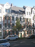 Apartment building in closed development with front garden