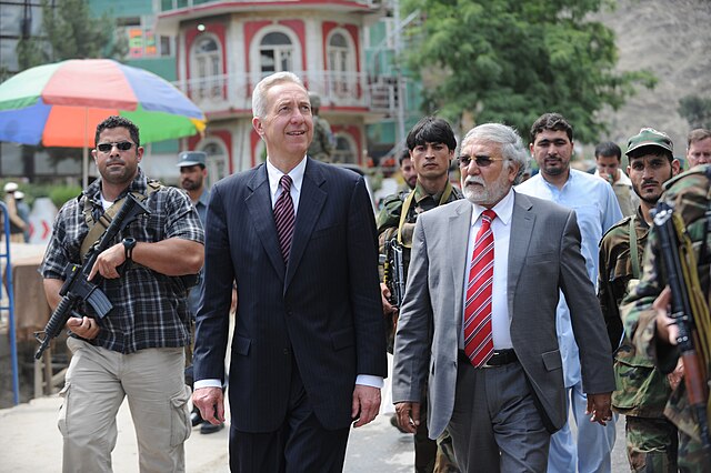 U.S. Ambassador Hans G. Klemm, Coordinating Director of Rule of Law and Law Enforcement, and Kunar Governor Fazlullah Wahidi walking through Asadabad 