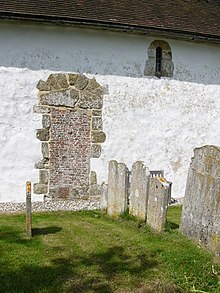 The south wall has an ancient blocked doorway. Hardham, St Botolph's church - geograph.org.uk - 449480.jpg