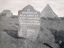 Stone erected shortly after the battle commemorating the Canadians who were killed Harts River Stone.png