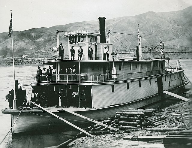 The Imnaha sternwheeler loading cordwood fuel, 1903