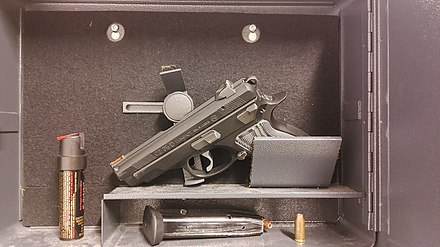 Visitor's unloaded pistol and a pepper spray within a courthouse gun safe