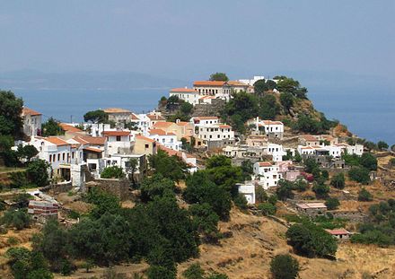 Ioulis, present-day capital of Kea (Ceos in Ancient Greek), including remnants of the ancient acropolis. Like most Cycladic settlements, it was built inland on a readily defensible hill as protection against pirates