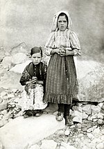 Lucia dos Santos (standing) Jacinta marto lucia santos.jpg