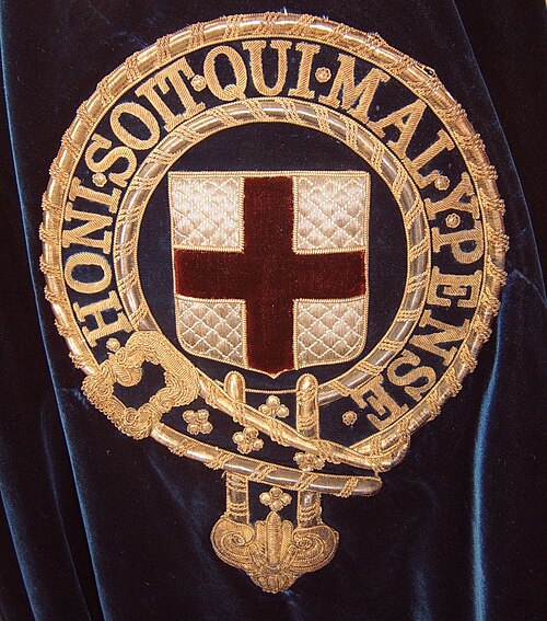 Badge of the Order embroidered onto the left shoulder of a Knight's blue velvet mantle