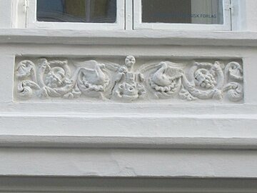 Stucco decoration below one of the windows