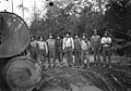 Logging crew standing next to stacked logs, Washington, ca 1909-1910 (INDOCC 1408).jpg
