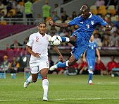 Johnson (left) playing for England at UEFA Euro 2012