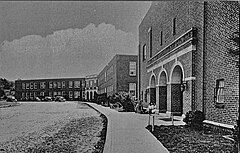 McKee Training School & Hoey Auditorium, two of many buildings on Campus built with help from the Works Progress Administration during the late 1930s and early 1940s. McKee Hall, as it has since been rechristened, was named for Gertrude Dills McKee, who was a great supporter of the university throughout her public life. McKee School 1940.jpg