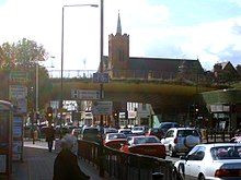 The Green Bridge adjacent to Mile End tube station in 2004