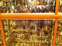 A collector's cabinet full of miniatures Miniature bottles collection.jpg
