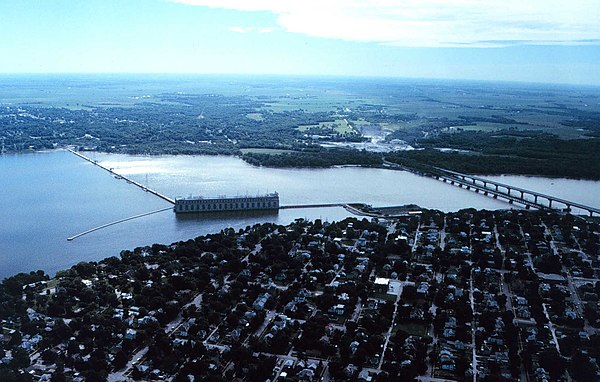 Keokuk, Iowa at bottom, with the Mississippi River, lock and dam No. 19, power plant, rail bridge and highway bridge.