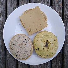 Clockwise from top: pepper jack, garlic and chive cheese spread, and lox cream cheese (all vegan). Miyoko's Creamery - three vegan cheeses.jpg