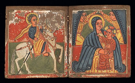 Ethiopian Orthodox wooden diptych of St. Mary and the infant Jesus with archangels above them. St. George appears on a white horse on the left. (Late 16th-early 17th century)