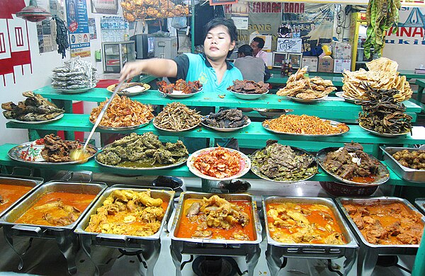 An array of nasi kapau dishes, Minangkabau Bukittinggi cuisine.