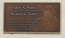 Plaque for LA Radio engineer John Paoli on the wall of the tower compound at KFI Paoli-plaque.jpg