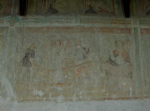 Gothic fresco showing Adam working with a plough after his expulsion from paradise, on the outer wall