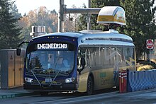 Catalyst operated by King County Metro Transit docked in Proterra's proprietary overhead charger Proterra electric bus at Eastgate P&R (22997239094).jpg