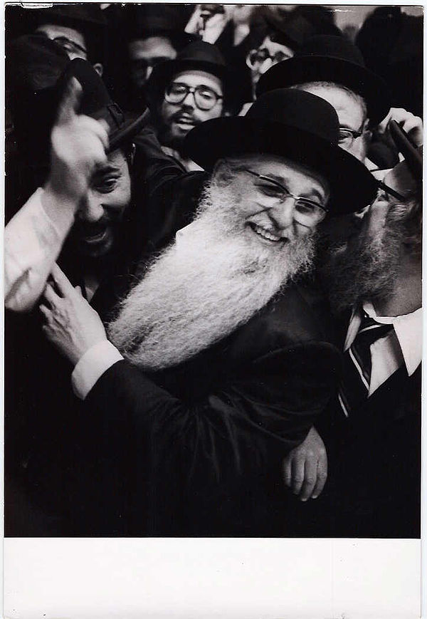 Aaron Schechter (white beard) celebrating Purim in Yeshiva Rabbi Chaim Berlin during the late 1970s.