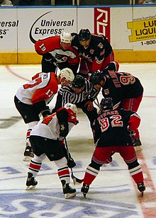 Michael Nylander with the New York Rangers (second row, far right) faces off against the Philadelphia Flyers on 4 January 2007 Rangers vs Flyers 2007 1.jpg