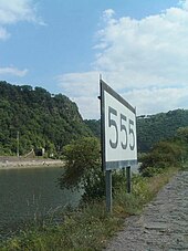 The 555 km marker, downstream from the Lorelei Rheinkilometer Loreley.JPG