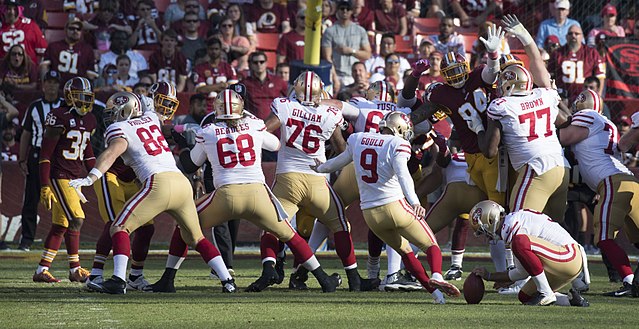 Gould kicking a field goal in a game against the Redskins