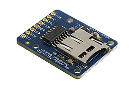 This breakout board allows an SD card's pins to be accessed easily while still allowing the card to be hot-swapped.