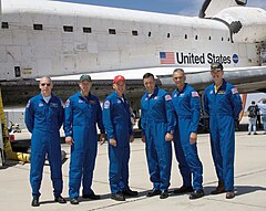 STS-117 crew pose for a picture after landing