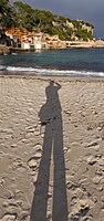 Rank: 47 Shadow of the photographer at the bathing beach in the bay Cala Llombards