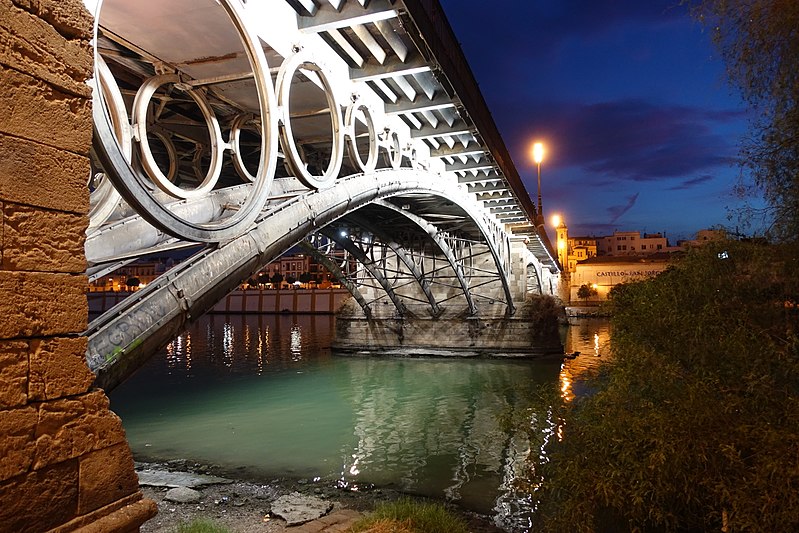 File:Sevilla triana bridge underside night.jpg