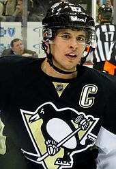 Sidney Crosby, the longest tenured captain in the NHL, and captain of the Pittsburgh Penguins since 2007. The captain can be identified by the large "C" on his jersey.
