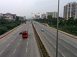 Aerial view of a fully concretized 10-lane stretch near Kharghar railway station.