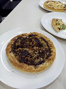 A personal-sized chocolate pizza Sweetza.jpg