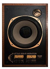 Studio monitor Little Gold Monitor (c. 1990) from Tannoy with two-way-coaxial construction, meaning the tweeter for frequencies from 1.400 Hz and above is located independently in the center of the 30 cm bass driver Tannoy Little Gold monitor - professional studio loudspeaker box.jpg