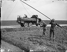 Royal Signals erecting cable poles in France, 1940. The British Army in France 1940 F3159.jpg