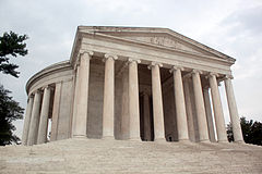 The monument's marble steps, portico, circular colonnade of Ionic order columns, and shallow dome