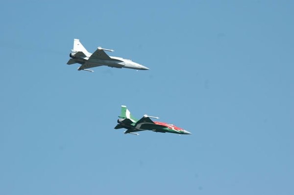 Two JF-17 multi-role fighters during a flypast performance in Islamabad on 23 March 2007, assembled by PAC earlier that month. Serial production of th