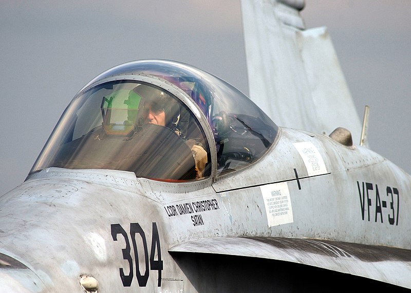 File:US Navy 050209-N-6363M-012 A Naval Aviator, assigned to the Bulls of Strike Fighter Squadron Three Seven (VFA-37), performs preflight checks on the flight deck aboard the Nimitz-class aircraft carrier USS Harry S. Truman (CVN 7.jpg