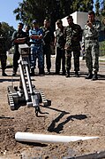 US Navy 091015-N-0260R-061 Sailors assigned to Explosive Ordnance Disposal Mobile Unit 3 train Sailors and Soldiers from Pakistan and Egypt on the use of the PackBot robot system to investigate a simulated Improvised Explosive.jpg